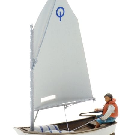 Sailing boat Optimist + figure 